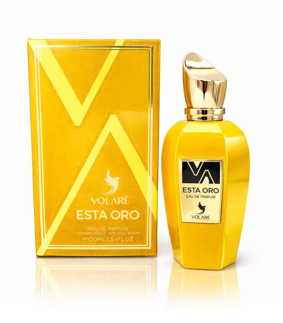 Volare Esta Oro caja y frasco sobre fondo blanco con reflejo de estudio