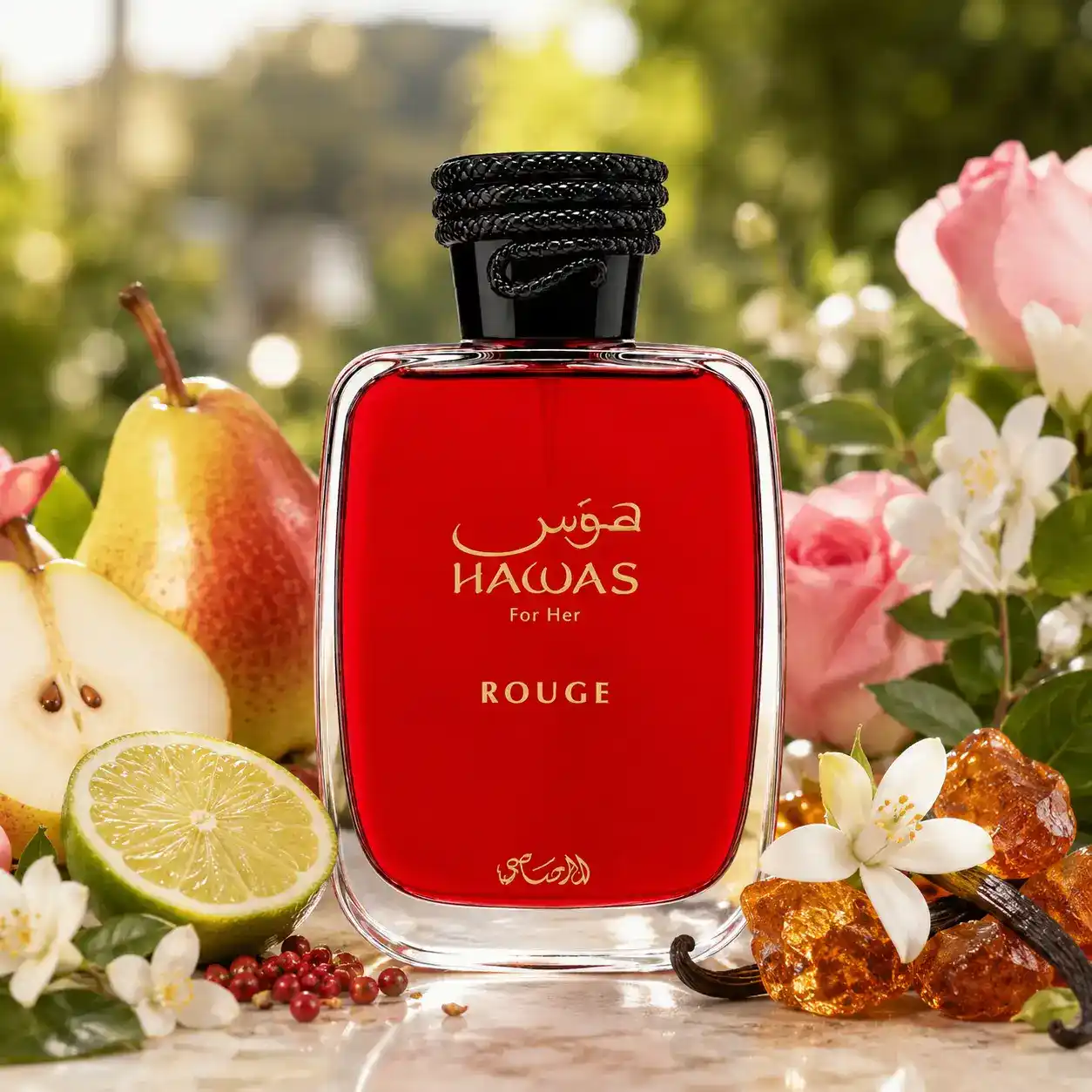 Frasco Rasasi Hawas Rouge sobre superficie blanca con reflejo