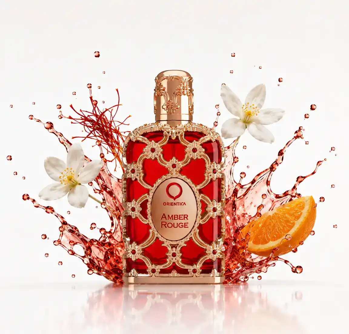 Presentación elegante de Orientica Amber Rouge sobre mármol cálido